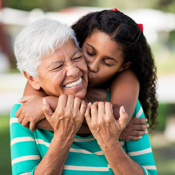grandma and granddaughter outside